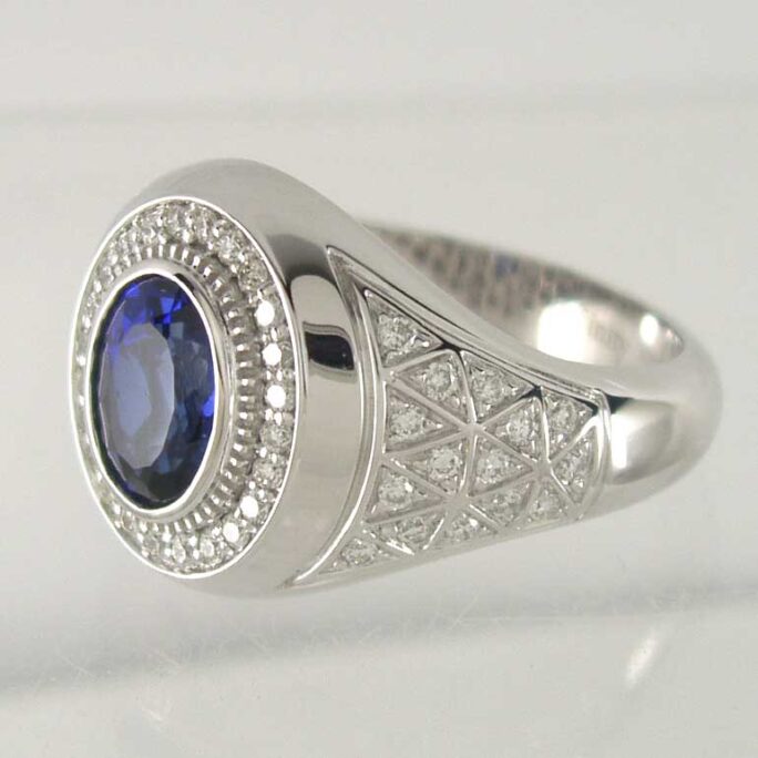 Oval Blue Sapphire & Bezel-set Diamond Halo Milgrain Ring